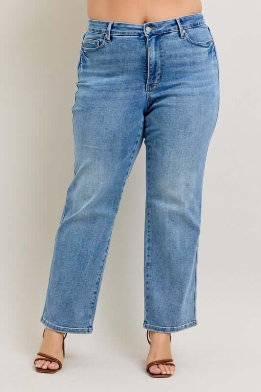 Judy Blue plus size tummy control vintage wash straight jeans in a comfortable fit for a flattering silhouette.