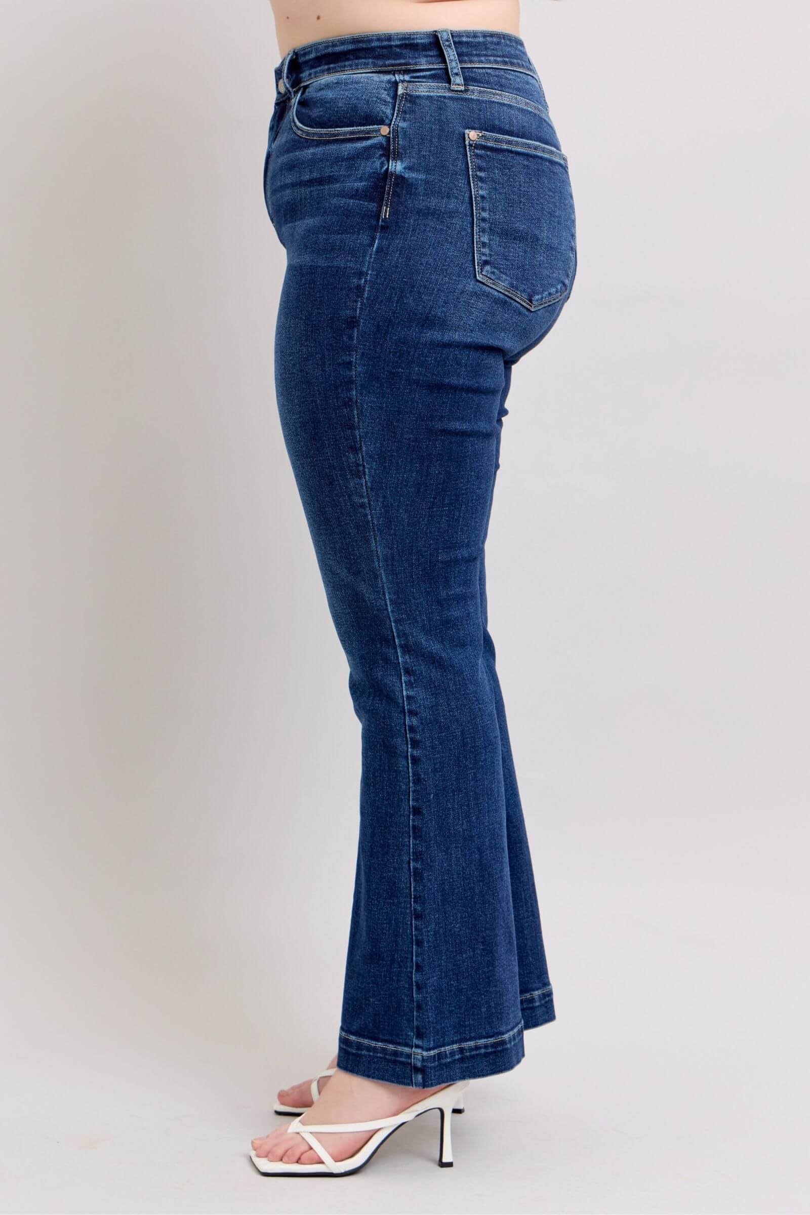 Judy Blue high rise flare jeans with pockets, showcasing a chic retro style and flattering silhouette.