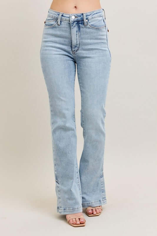 Judy Blue Plus Size Tummy Control Vintage Wash Slim Boot Jeans with Side Slit, perfect blend of comfort and style.