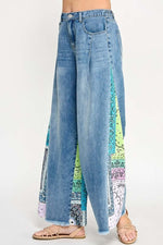 SAGE + FIG Raw Hem Wide Leg Jeans with Paisley Print Side Detail, perfect for a trendy fashion statement.