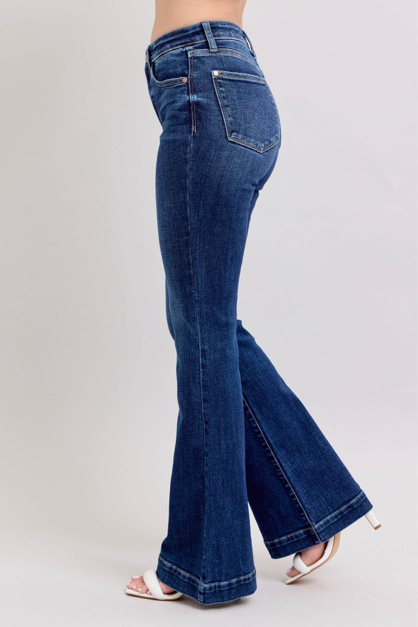 Judy Blue full size high rise flare jeans showcasing chic retro style and functional pockets, perfect for any wardrobe.