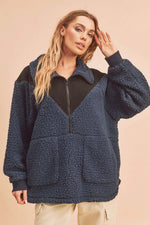 Cozy Aemi+Co two tone half zip fleece sweatshirt in navy, featuring a stylish fleece texture and relaxed fit.