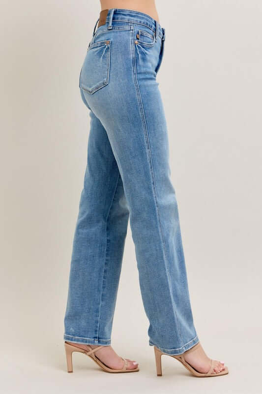 Model showcasing Judy Blue Plus Size Tummy Control Vintage Wash Straight Jeans in a chic side view.
