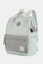 Himawari mint green waterproof backpack with external USB port and front pocket for convenient travel and outdoor use.