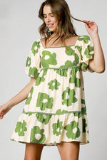 Umgee full size floral mini dress with short sleeves, featuring green flowers on a cream background, perfect for warm weather.