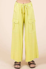 Bright yellow French Terry cargo wide leg pants with utility pockets, perfect for stylish and comfy everyday wear.