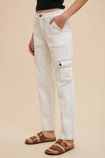 Model wearing Annie Wear straight leg jeans with cargo pockets, showcasing a stylish and functional design.