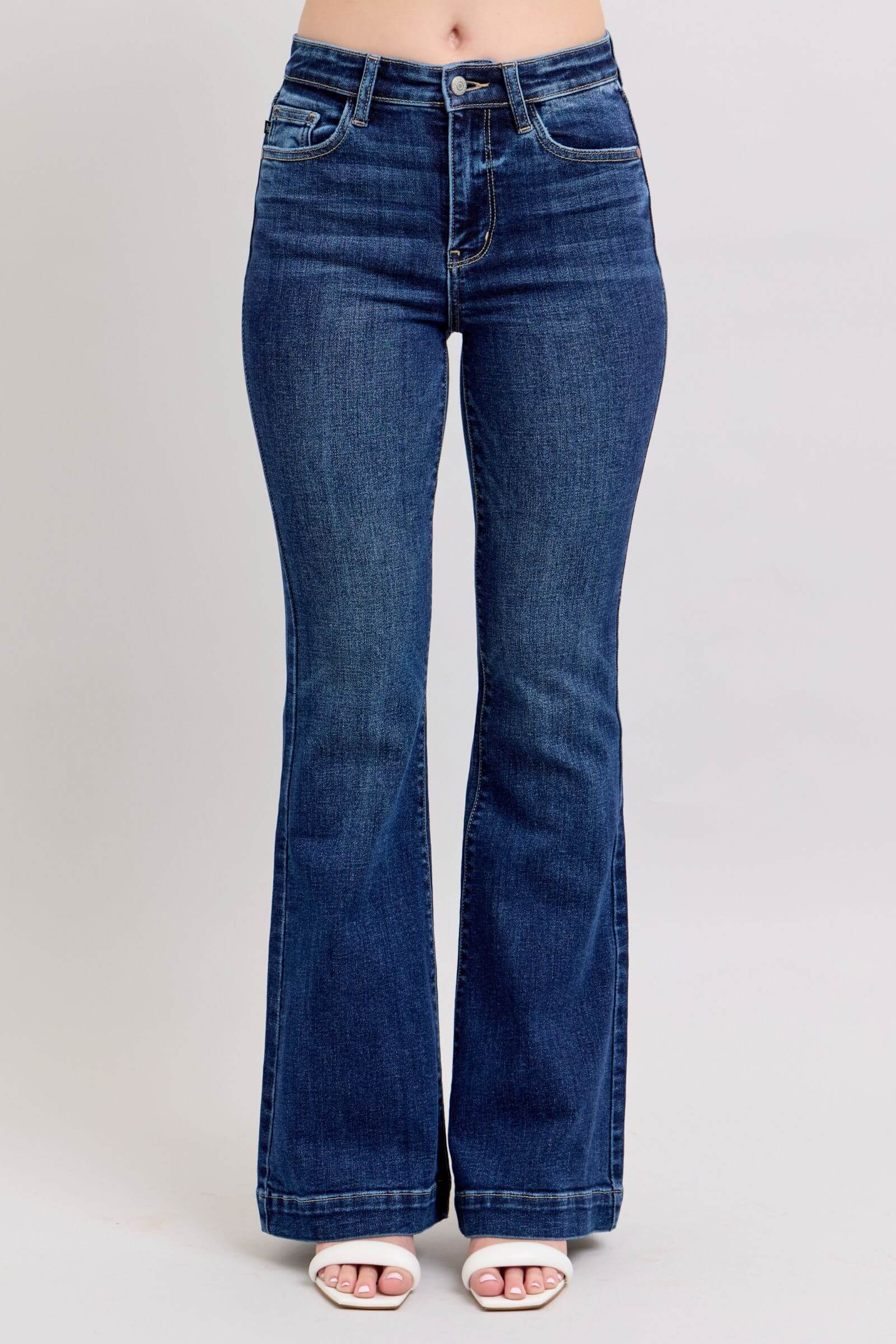 Judy Blue high-rise flare jeans in dark wash with pockets, perfect for a trendy plus size wardrobe.
