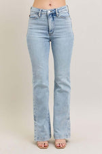 Judy Blue full-size tummy control vintage wash side slit slim boot jeans in light blue, perfect for style and comfort.