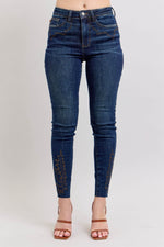 Judy Blue plus size high rise skinny jeans with unique embroidery detail, perfect for a stylish and comfortable fit.