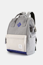 Himawari Contrast Waterproof Backpack Bag in gray and beige with external USB port for easy charging on the go.