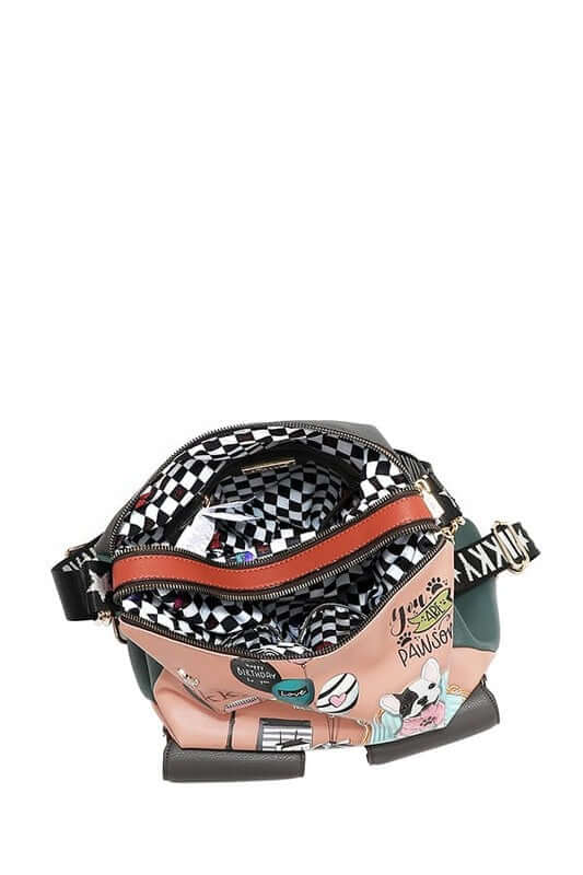 Inside view of the Nicole Lee USA multifunction adjustable strap eco-leather backpack showcasing its vibrant design and spacious compartments.