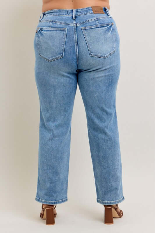 Back view of Judy Blue full size tummy control vintage wash straight jeans plus size, showcasing a flattering fit.