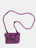Elegant purple envelope crossbody bag with removable strap, perfect for chic and versatile style.