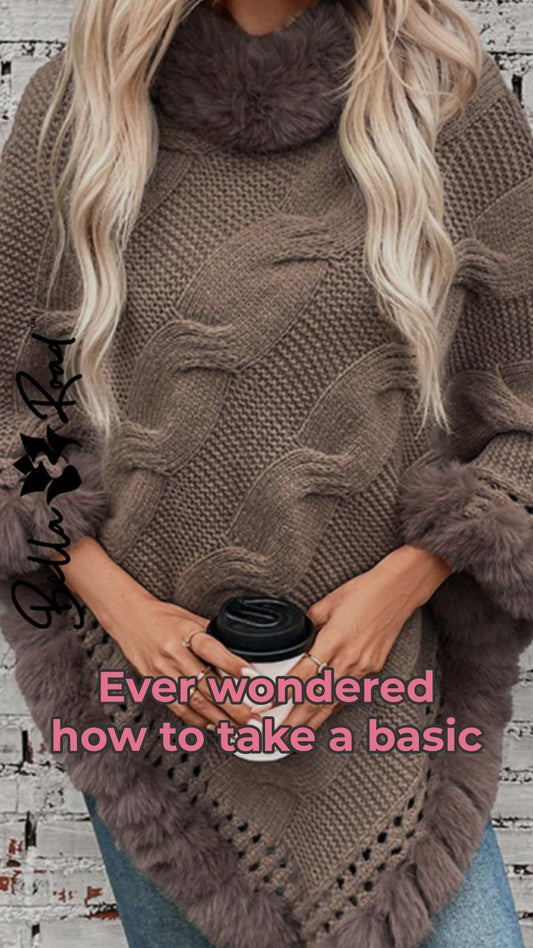 Stylish woman in a cozy fuzzy hem cable-knit poncho holding a coffee cup, showcasing a chic fall look.