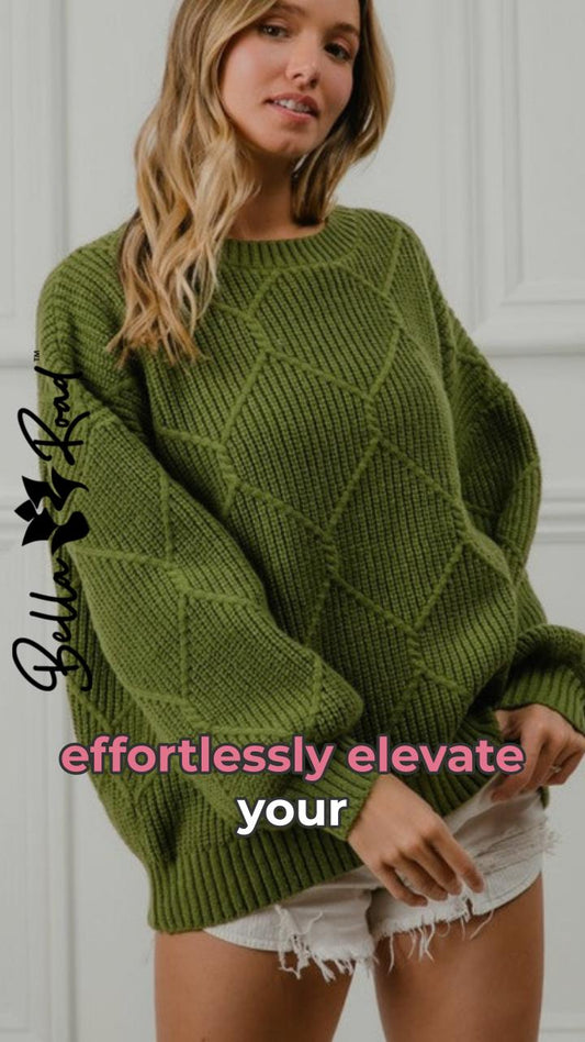 Model showcasing a BiBi diamond texture round neck long sleeve sweater in green, emphasizing effortless style and comfort.