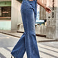 Woman wearing Bella Road High Rise Bootcut Jeans with Pockets, featuring a flattering fit and trendy bootcut style, perfect for any outing.