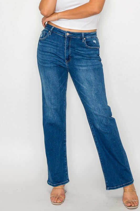 Model showcasing bytos Cat's Whiskers High Rise Straight Jeans in dark blue, featuring a flattering fit and stylish straight-leg cut.