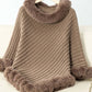 Cozy Bella Road Fuzzy Trim Poncho with three-quarter sleeves, featuring a stylish ribbed texture and fluffy trim. Perfect for chilly days!