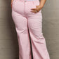 Risen Jeans Raelene High Waist Wide Leg Jeans in Light Pink for a chic and modern look, flattering various body types with retro flair.