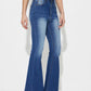 Woman wearing mid-rise waist bootcut jeans with pockets and buttons, no stretch, made of 85% cotton and 15% polyester.