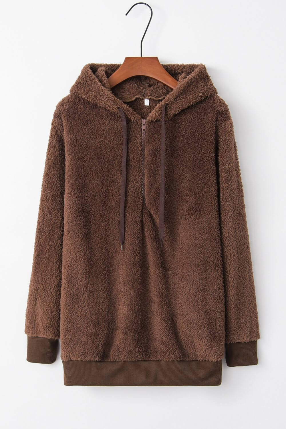 Cozy brown teddy hoodie with quarter-zip and drawstring, perfect for chilly days and casual outings.