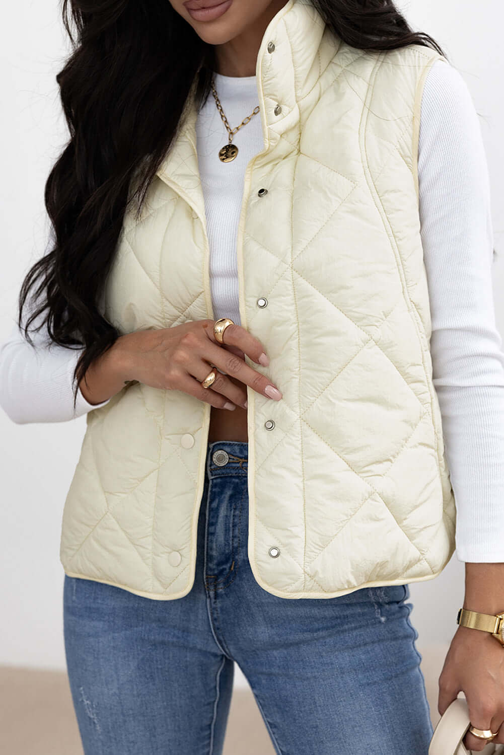 Stylish ivory snap down vest coat with texture and pockets, perfect for fall and winter fashion from Bella Road.