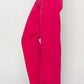 High Rise Wide Leg Jeans in vibrant pink, showcasing a retro-inspired style and comfortable fit by Risen Jeans.