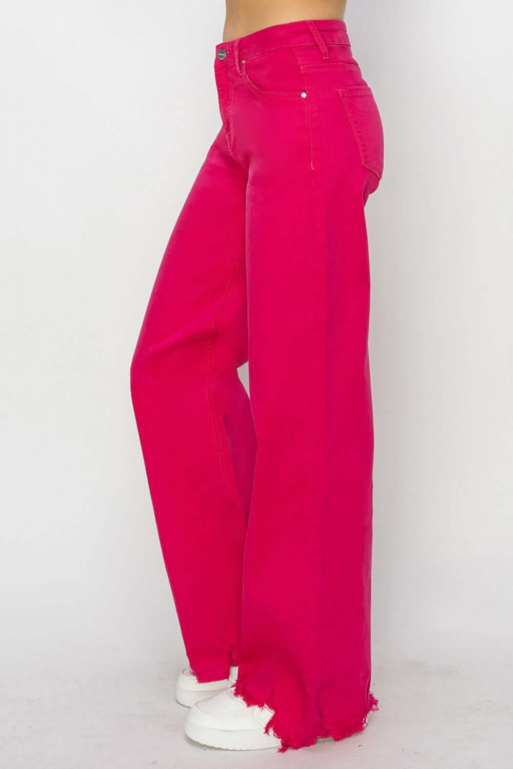 High Rise Wide Leg Jeans in vibrant pink, showcasing a retro-inspired style and comfortable fit by Risen Jeans.