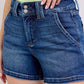 Judy Blue plus size denim shorts with double button waistband, high-waisted and slightly stretchy for comfort.