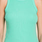 Woman wearing ribbed round neck tank top in teal green for a casual and versatile look