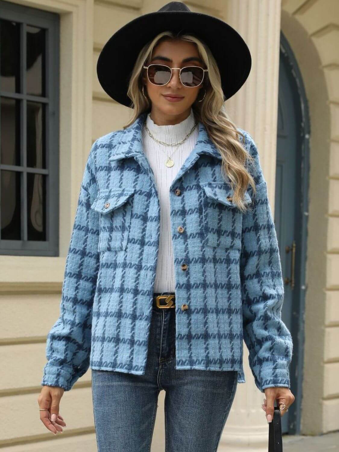 Woman wearing Bella Road Plaid Collared Neck Long Sleeve Jacket with buttoned front and pockets, styled for cool weather with a hat and sunglasses.