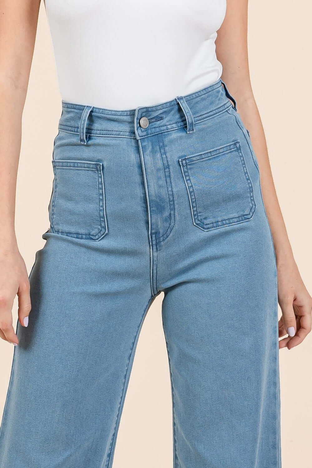 Mittoshop high-waisted wide leg jeans with front patch pockets, crafted from soft denim knit fabric for comfort and style.