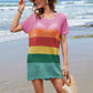 Bella Road Swim colorful openwork cover-up on a beach, perfect for stylish summer days by the ocean.