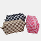 Stylish checkered pattern knitted cosmetic pouches in black, pink, and brown, perfect for organizing makeup essentials.