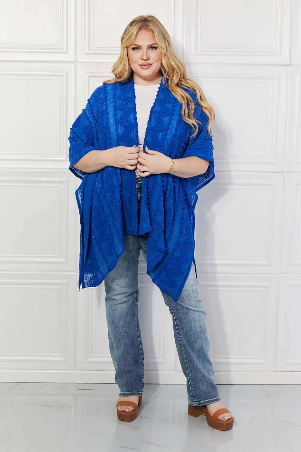 JUSTIN TAYLOR Pom-Pom Asymmetrical Poncho Cardigan in Blue at Bella Road