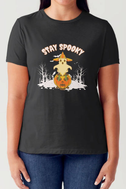 Woman wearing Simply Love Full Size STAY SPOOKY Graphic Round Neck Short Sleeve Tubular T-Shirt for Halloween.