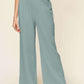 DOUBLE TAKE Full Size Texture Smocked Waist Wide Leg Pants at Bella Road