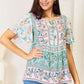 DOUBLE TAKE Floral Tie Neck Short Sleeve Blouse at Bella Road