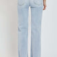 Back view of high rise distressed wide leg jeans by Risen Jeans, featuring a chic and trendy design with frayed hems.