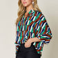 DOUBLE TAKE Full Size Geometric Notched Raglan Sleeve Blouse at Bella Road