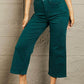 Woman wearing Hailey full-size tummy control high-waisted cropped wide-leg Judy Blue jeans.