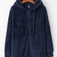 Cozy navy teddy hoodie with a quarter-zip, drawstring closure, and soft texture for ultimate comfort.