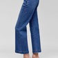 Side view of RISEN Tummy Control High Rise Crop Jeans, featuring a flattering fit and stylish crop length.