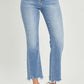 Risen Jeans frayed hem cropped straight jeans in light blue, styled with heels for a trendy and chic casual look.