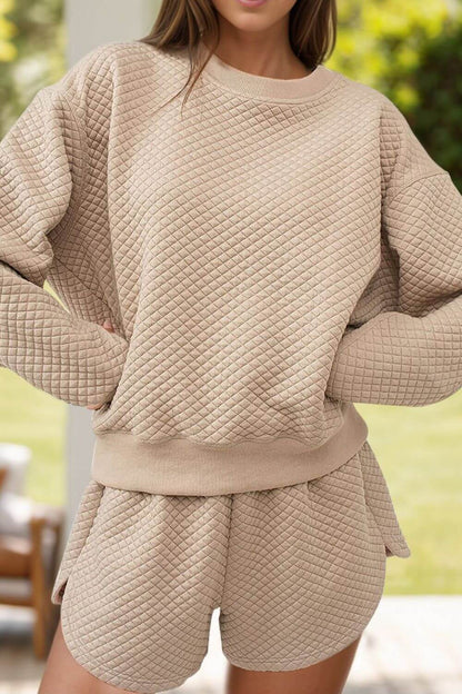 Cozy Bella Road quilted round neck top and shorts set, perfect for lounging in style. Soft fabric, two-piece, slightly stretchy.