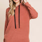 Cozy contrast drawstring knit hoodie with drop shoulders, perfect for a trendy casual look.