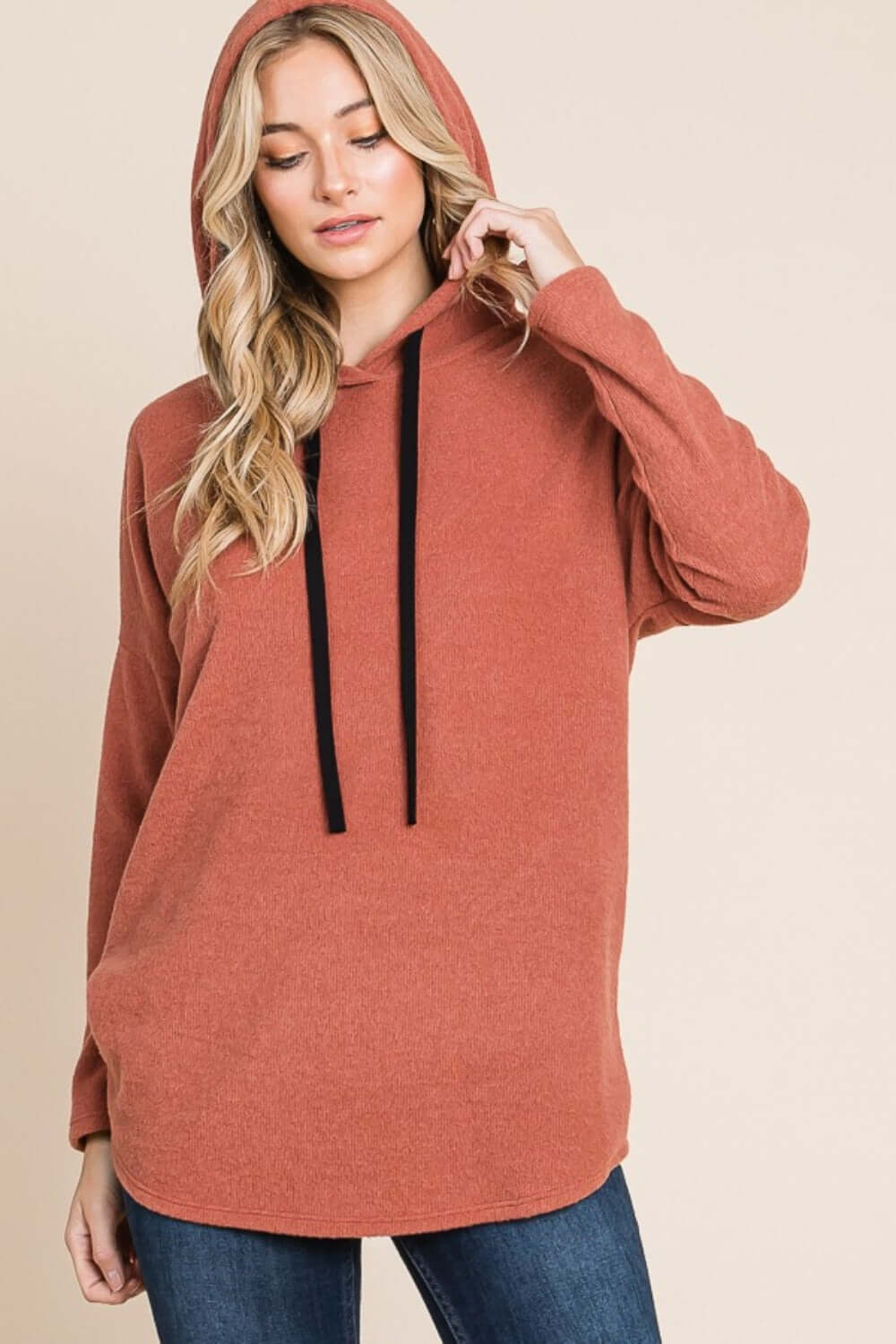 Cozy contrast drawstring knit hoodie with drop shoulders, perfect for a trendy casual look.