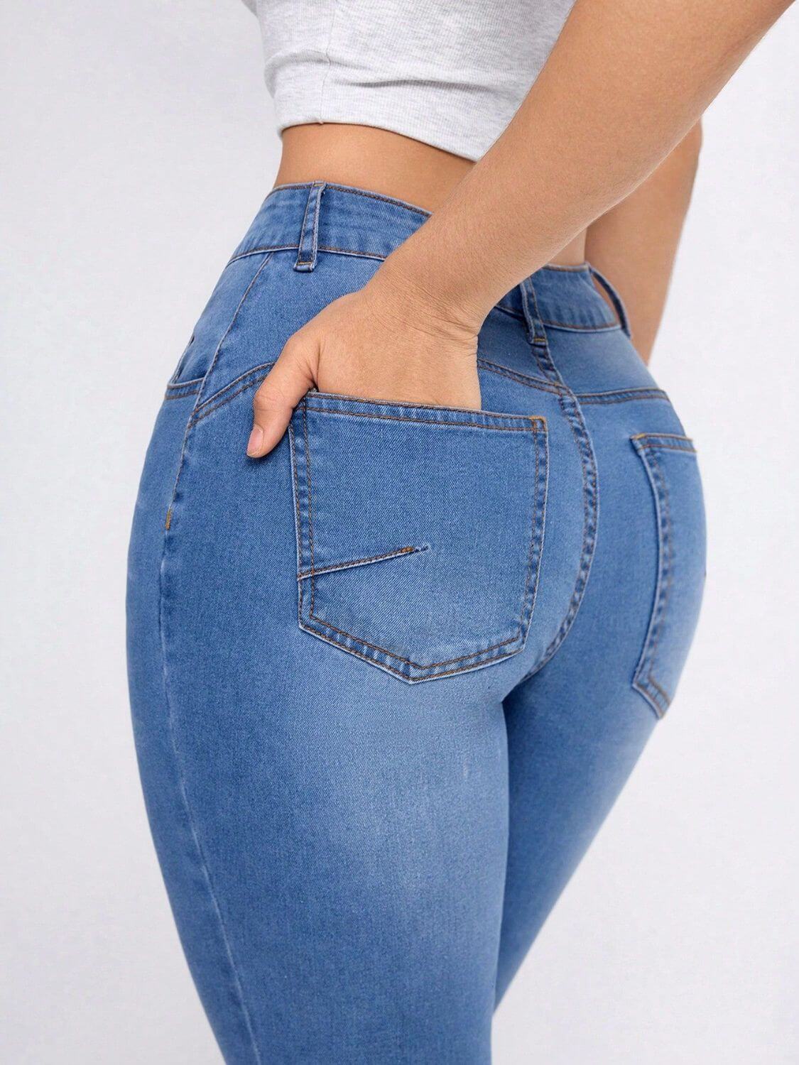 Woman wearing Bella Road High Rise Skinny Jeans with Pockets showing back view, highlighting comfortable fit and moderate stretch.