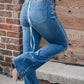 Stylish Pearl Trim High Waist Bootcut Jeans with slightly stretchy material, perfect for a chic and comfortable look.